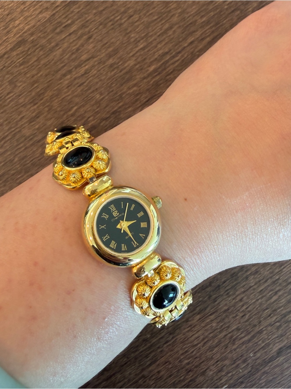 Gold and Black Floral Link Women's Watch - Elegant Bracelet Style